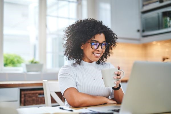 a woman studying for the GMAT at home